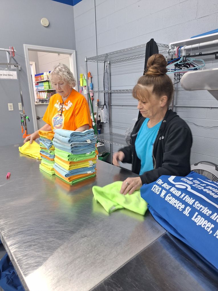 Staff doing wash and fold service